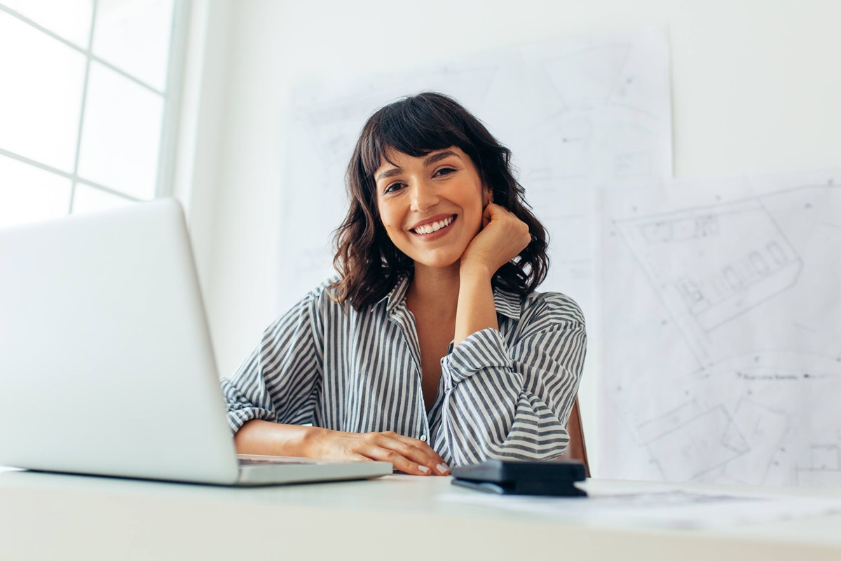 A member sitting in front of her laptop